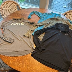 Lot of 4 gently used Under Armour half zip mens x- small or youth xl.